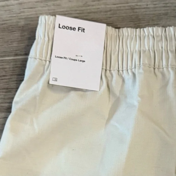 Nike Sportswear Essentials Mid-rise Convertible Cargo Maxi-Mini Skirt - Picture 13 of 15